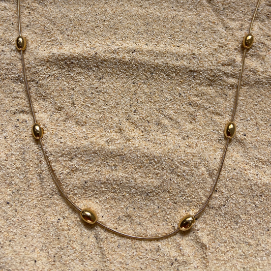 Collar fino dorado Arena