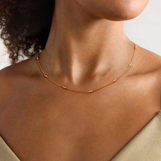 Collar fino dorado Arena