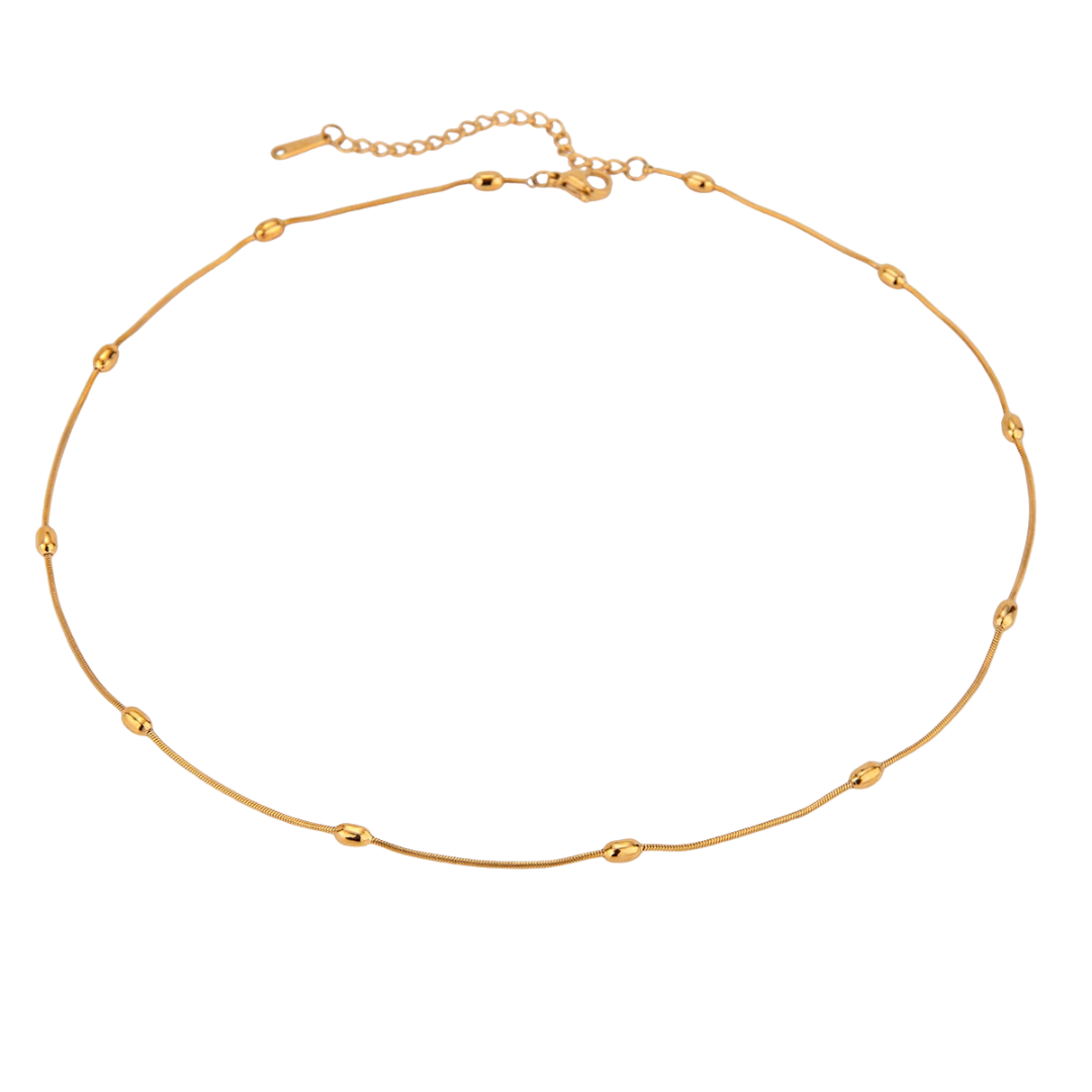 Collar fino de cadena dorada modelo Arena de Auredune, vista de perfil