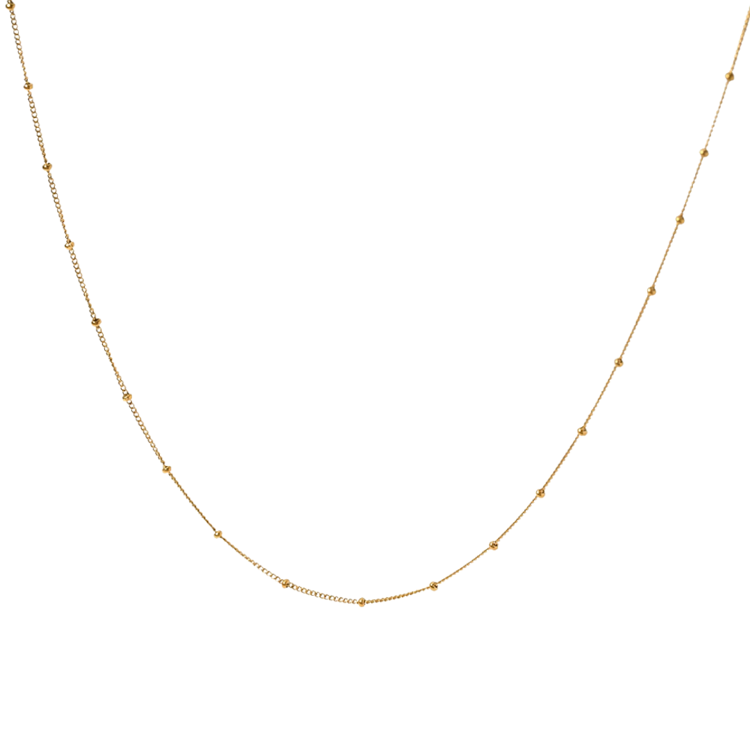 Collar fino de cadena dorada modelo Duna de Auredune, detalle del acabado