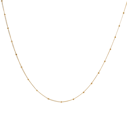 Collar fino de cadena dorada modelo Duna de Auredune, detalle del acabado