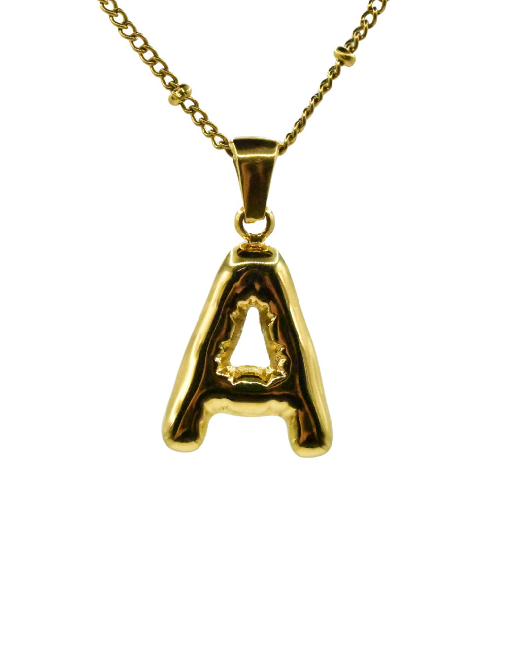 Conjunto de collar dorado Duna con charm de letra inicial de Auredune, vista de perfil
