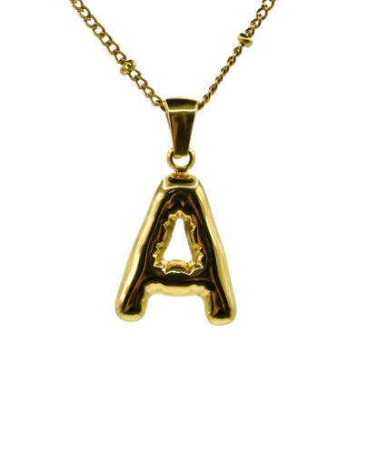 Conjunto de collar dorado Duna con charm de letra inicial de Auredune, vista de perfil